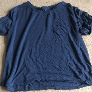 I have a extremely comfortable navy blue shirt with a pocket on the front.